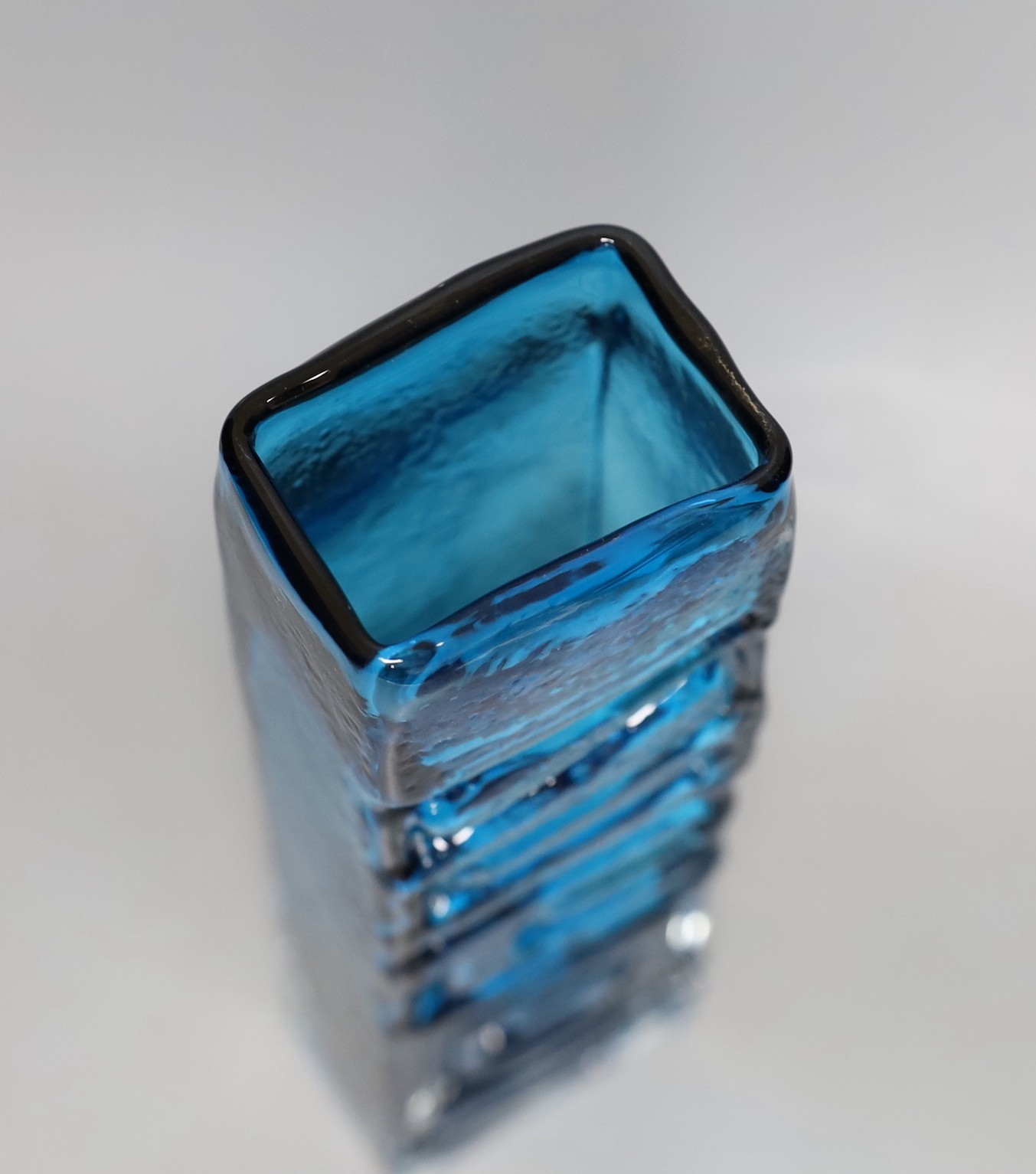 A Whitefriars 'Totem Pole' glass vase, designed by Geoffrey Baxter, pattern number 9671, blue glass, 26.5cm tall